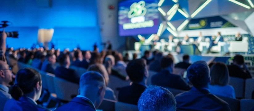 A large crowd of attendees gathered at a conference