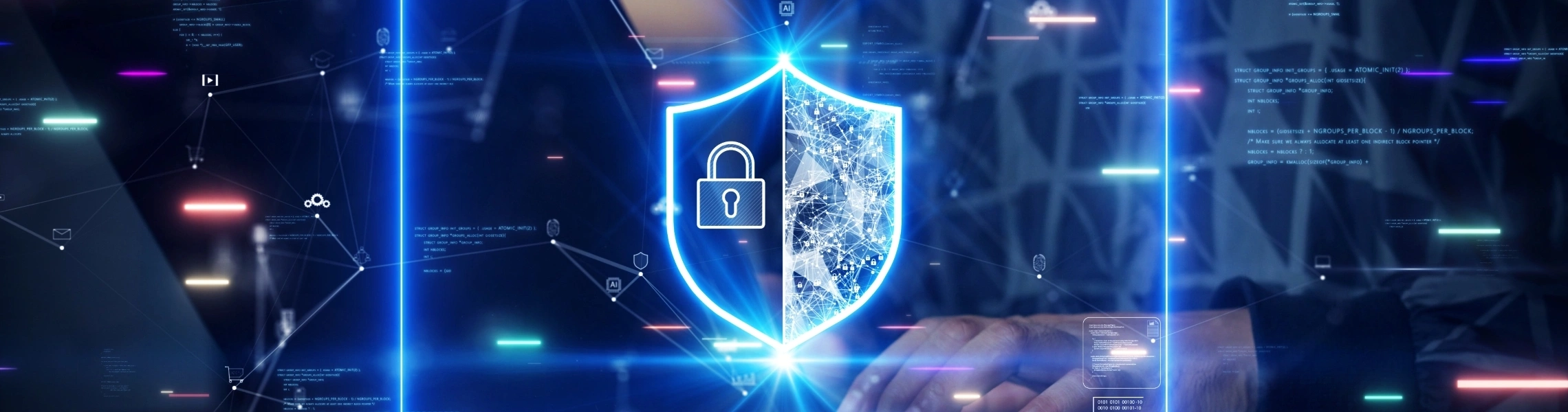 A person holds a shield featuring a digital image of a computer screen