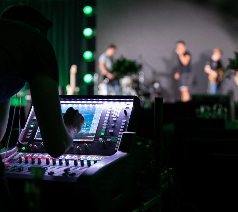 well-equipped recording studio showcasing multiple monitors and keyboards for music creation and editing